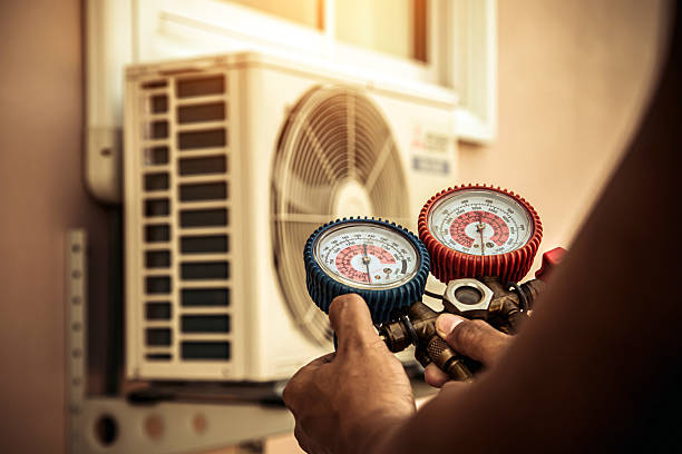 Professional Hvac technician working in Rossburg, OH